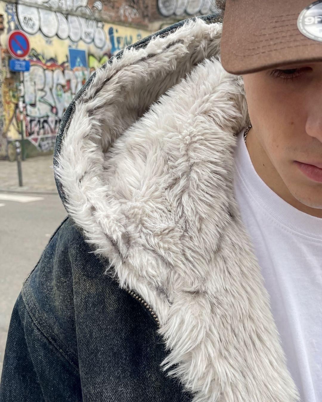 Faux fur lining inside hooded denim jacket — open collar view