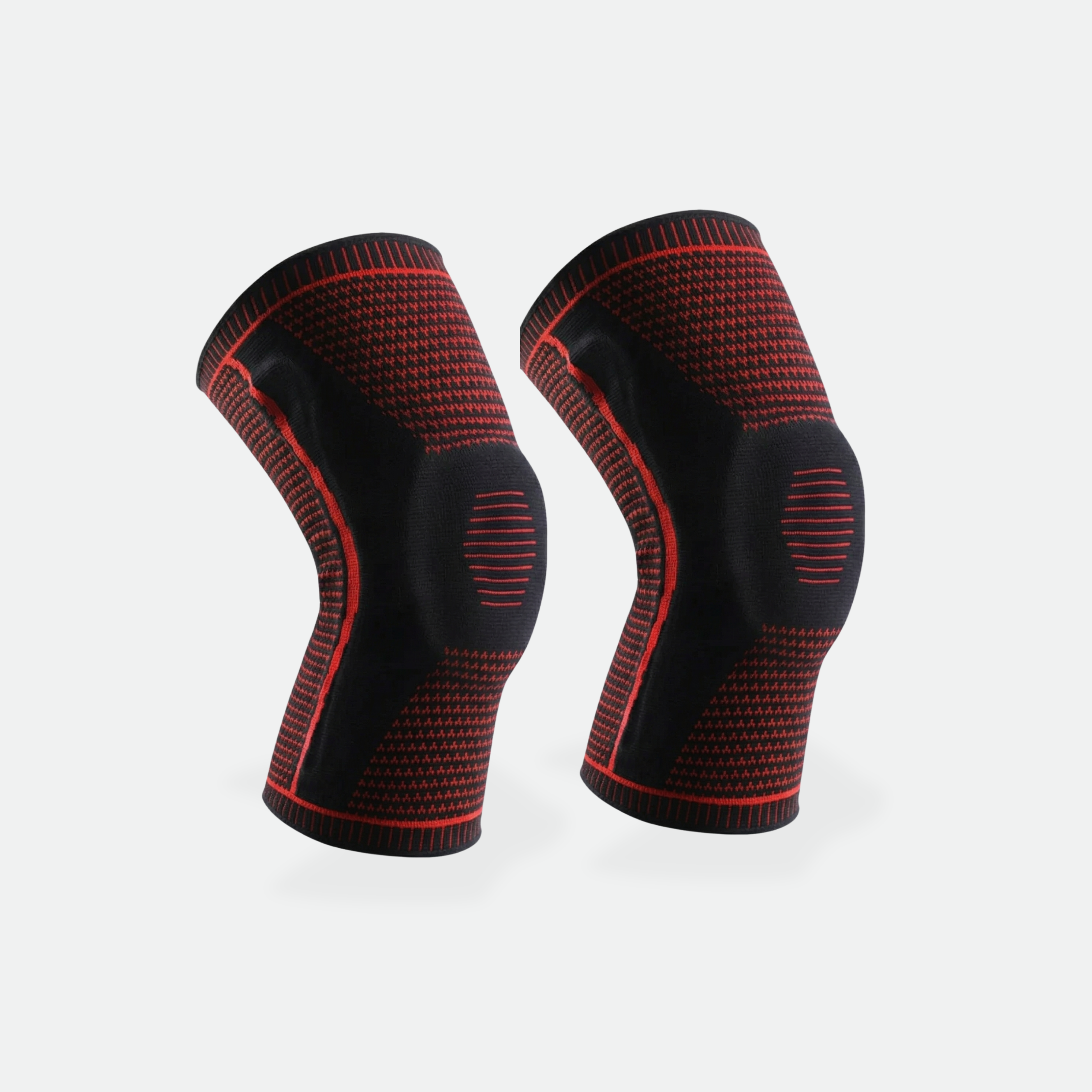 Pair of black and red knee sleeves on a white background