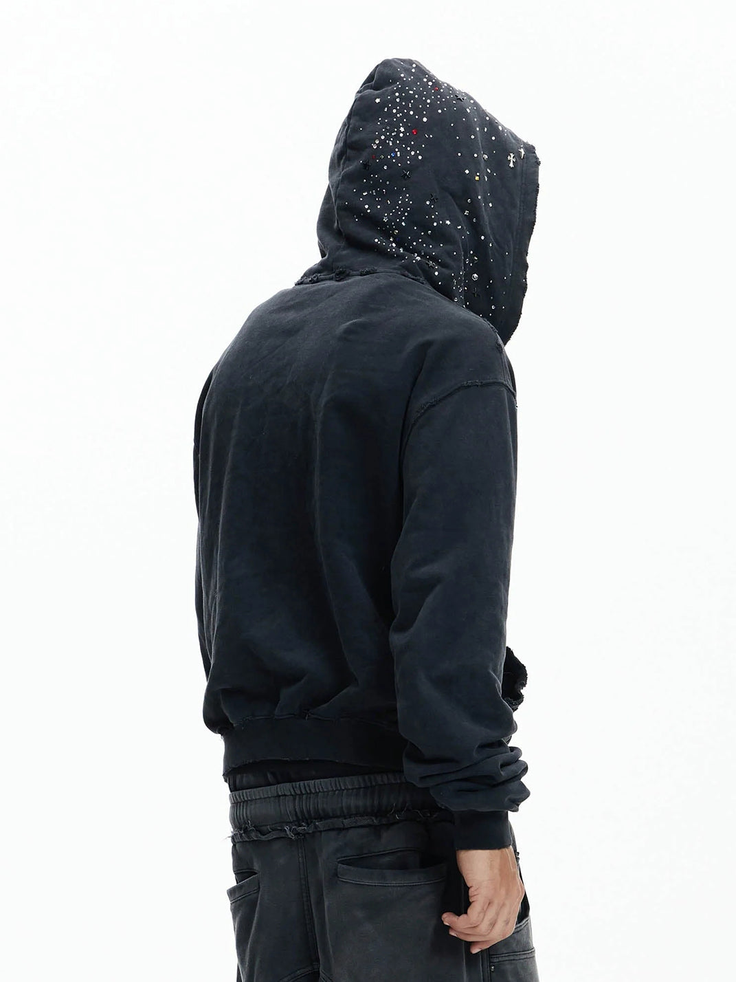 Distressed rhinestone hoodie — back shoulder view, hood up