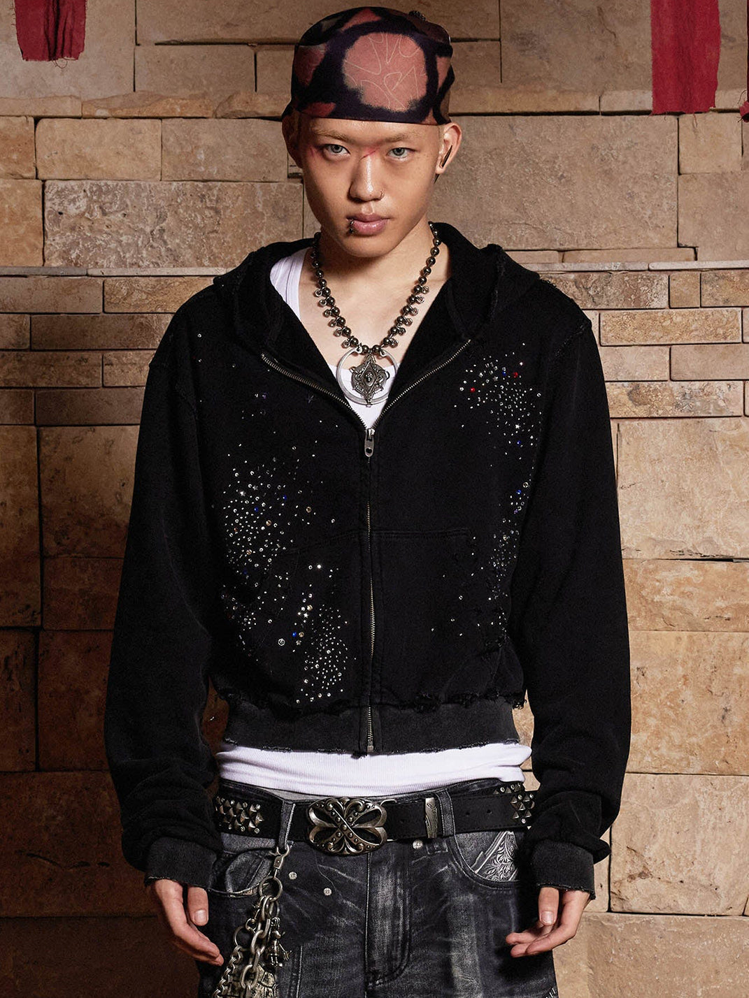 Colorful rhinestone hoodie styled open over white tee — front view