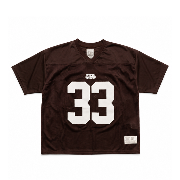 Brown sports jersey with number 33 on a white background