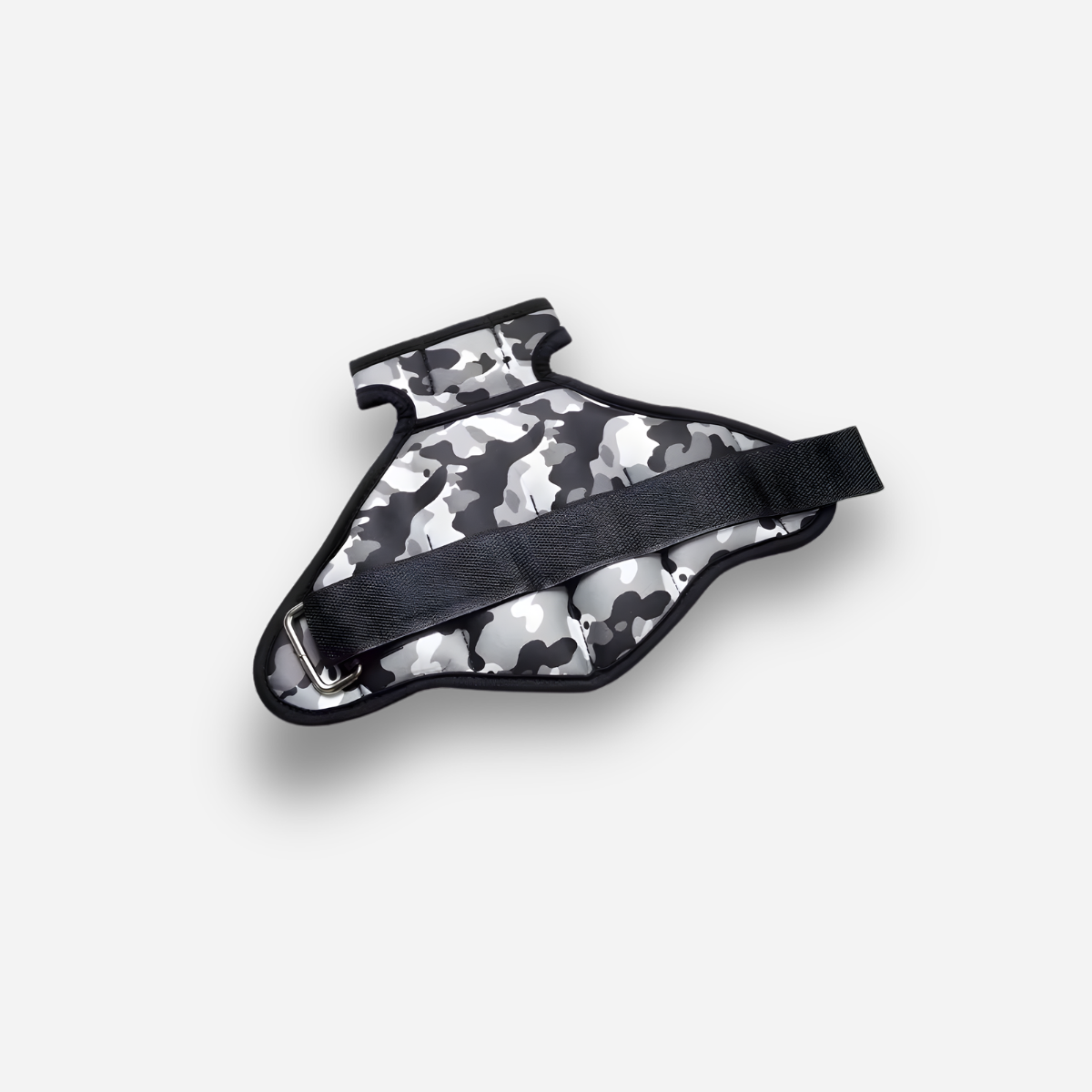 Camouflage-patterned dog vest with a black strap on a white background