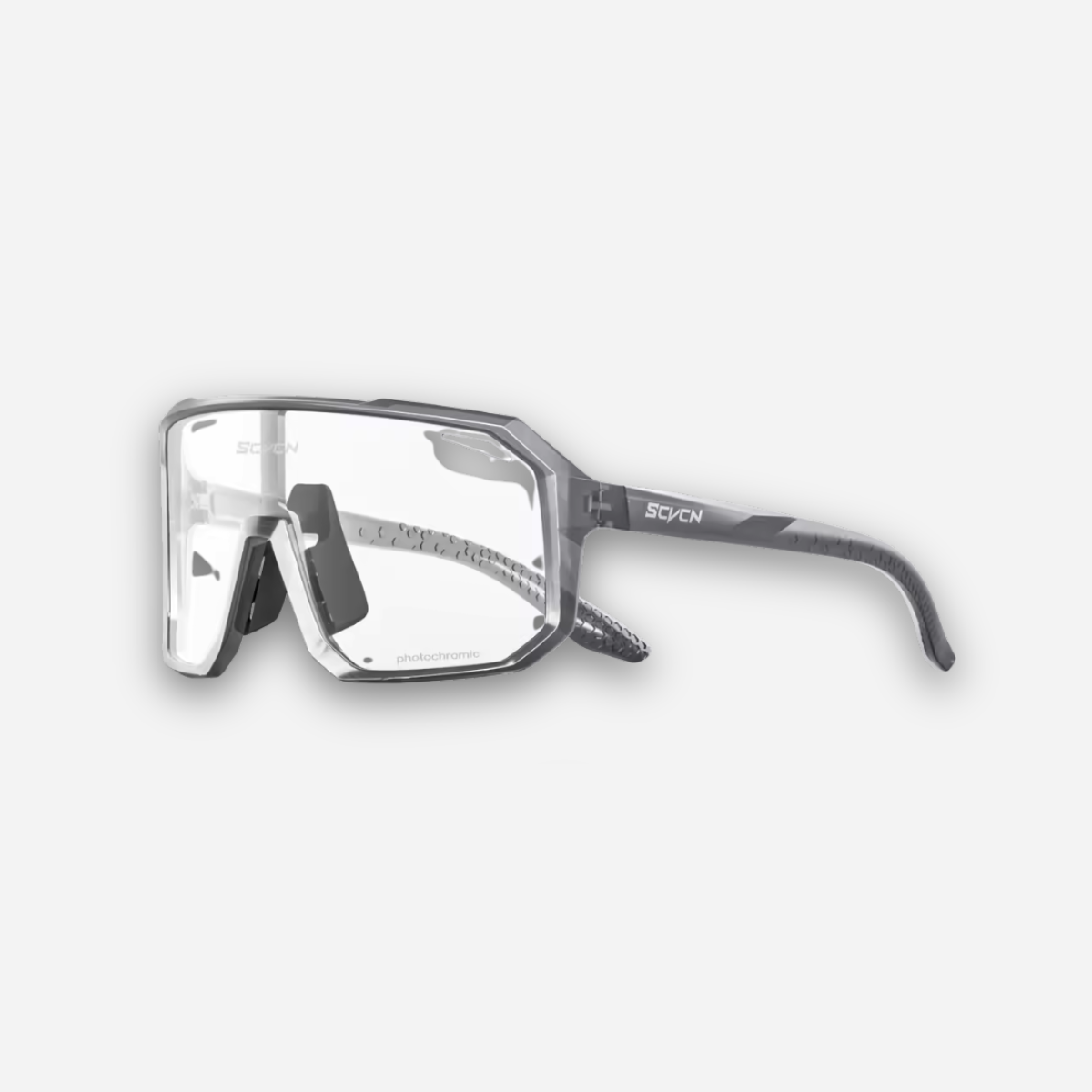 Sunglasses with a clear lens on a light gray background